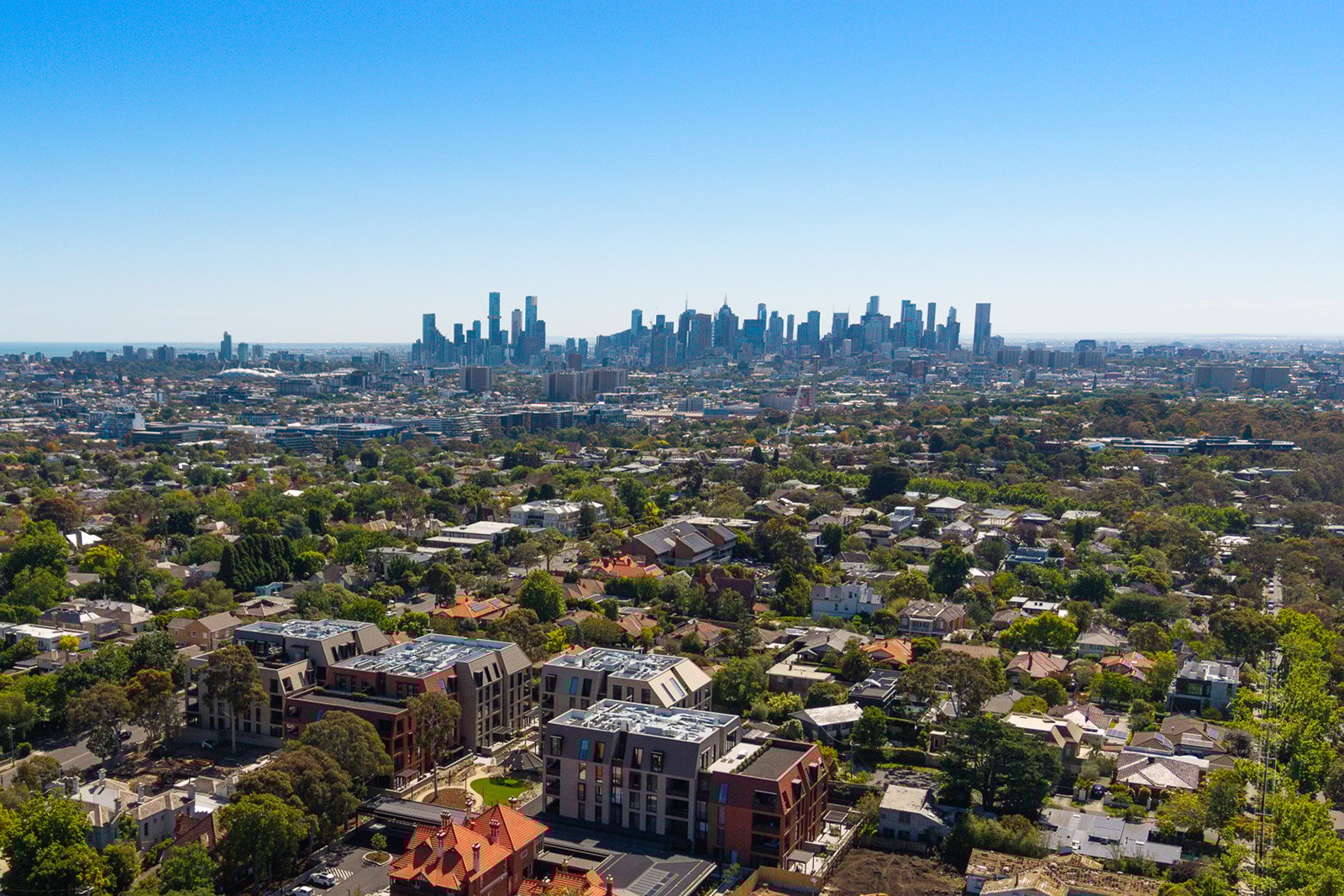 Aerial over St. Clare, Melbourne CBD in background