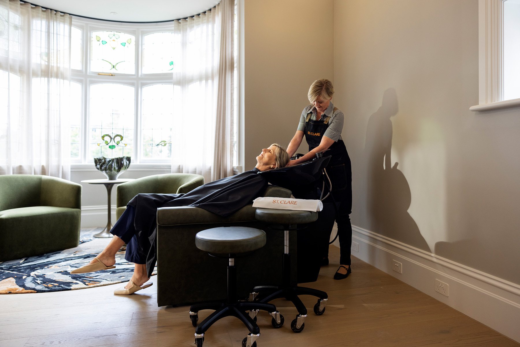 St. Clare hairdresser washing hair