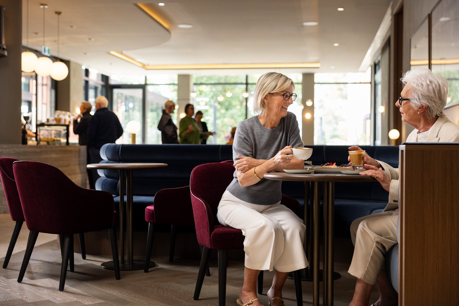 Women enjoying coffee in St. Clare cafe